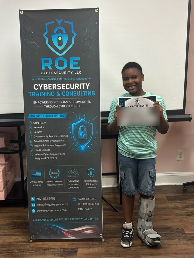 A smiling student holds an ROE Cybersecurity certificate next to the ROE Cybersecurity training banner